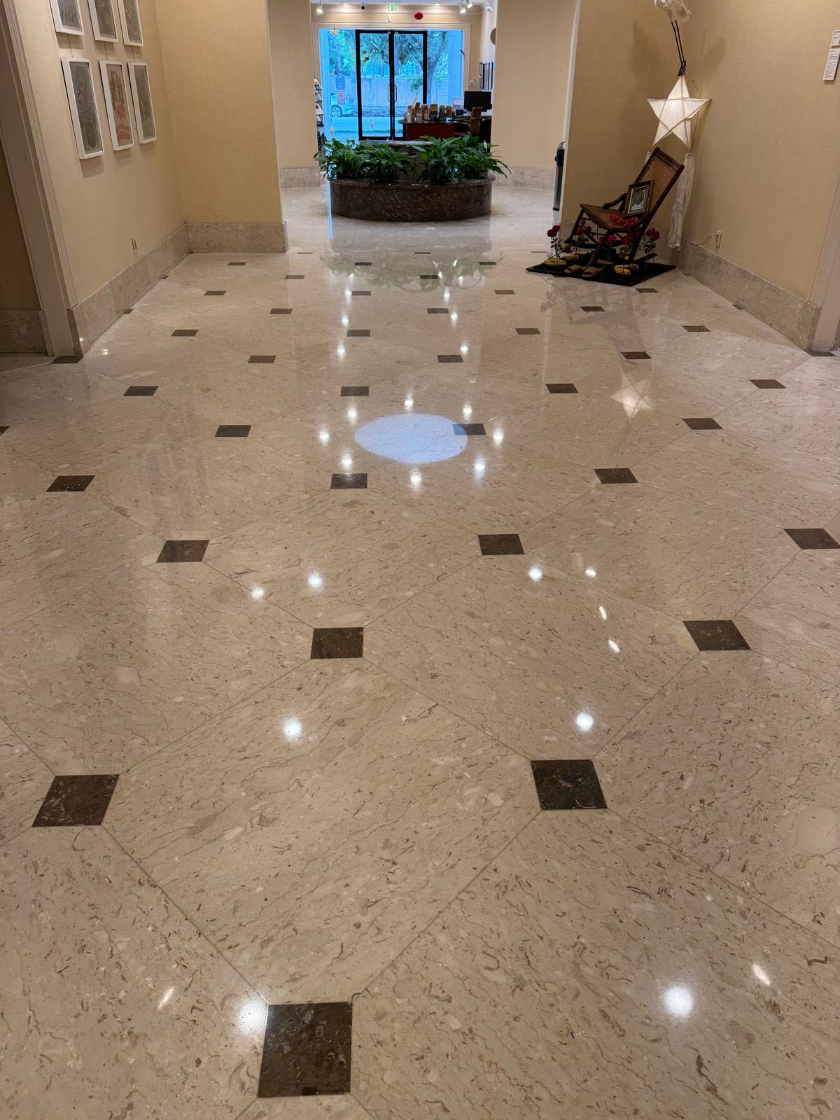Diamond-inlay marble lobby floor, cleaned and polished